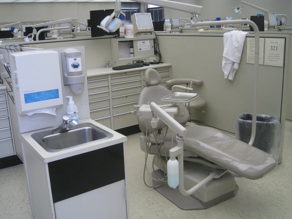 An empty dental chair in a clinic